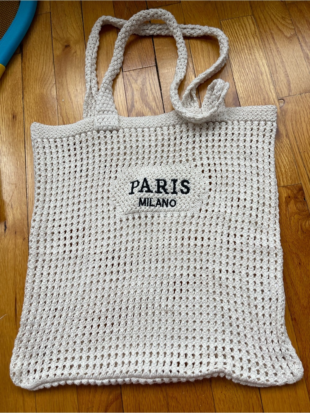 Handwoven Natural Straw Tote Bag with Logo Accent - Picture 2 of 3